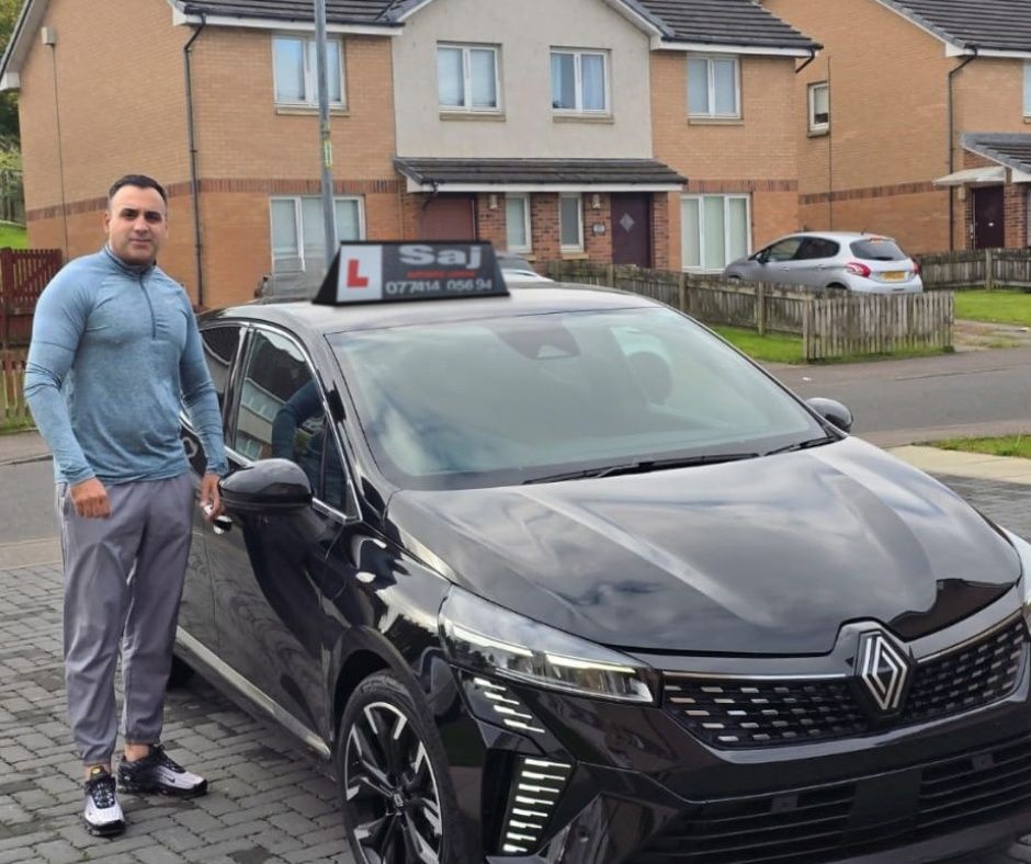 Pull Up Driving School instructor with the lesson car