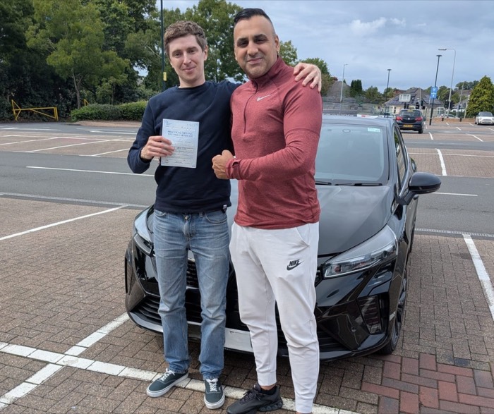 Pupil with pass certificate and instructor